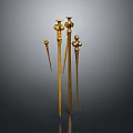 Ancient Golden Metal Weapons Collection Featuring Various Lengths And Decorative Tops