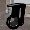 Black Coffee Maker with Glass Carafe and Automatic Brew Function on Kitchen Countertop 3d model