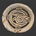 Intricate Ancient Circular Sculpture Carving with Geometric Patterns Eye Design and Pale Orange Speckled Openwork