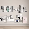 Modern Photo Wall Decor With Various Sized Frames And Artistic Pictures Arrangement
