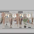 Elegant Clothing Store Window Display With Mannequins Plants Golden Frames And Circular Decorations