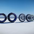 Various Motorcycle Tires With Different Tread Patterns And Rim Designs On 3d model