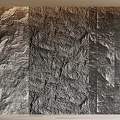Natural Stone And Wood Wall Design With Textured Surface For Interior Spaces