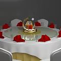 Round Dining Table Set With White Tablecloth Gold Rotating Centerpiece White Chairs Red Napkins Glassware