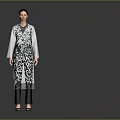 Woman Wearing Light Blue Long Coat With Black Inner Top Pants Standing Against Grey Background