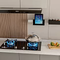 Modern Kitchen With Gas Stove Blue Flames Pot Tablet And Sliced Fruits