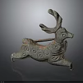 Ancient Bronze Deer Sculpture in Running Posture With Intricate Patterns and Green Patina