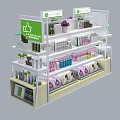 Multi tiered Retail Display Shelves with Colorful Products Green Signage and Decorative Flowers
