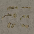 Gold Wall Mounted Faucets In Various Designs Showcased On Grey Wall