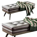 Dark Brown Tufted Leather Ottoman Bench With Green Striped Fringed Blanket