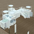 Modern Container Building Structure with Wooden Platform and White Flagpoles in Sandy Area