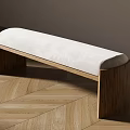 Stylish Wooden Frame Bench With White Upholstered Seat On Herringbone Floor