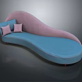 Curved Multi Person Sofa With Pink And Blue Upholstery And Cushions