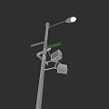Outdoor Street Light Mounted On Metal Pole With Surveillance Cameras And Fixtures