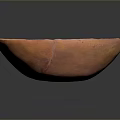 Artisanal Hand Carved Orange Clay Bowl With Intricate Decorative Surface Patterns And Smooth Edges