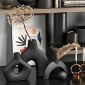 Stylish Decorative Ornament Combination Featuring Vases Books And Minimalist Shelves In Neutral Tones
