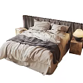 Neutral Toned Double Bed With Upholstered Headboard Folded Bedspread Wooden Nightstand And Table Lamp