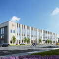 Modern Industrial Factory Building With Large Windows Surrounding Greenery And Parking Area