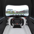 White Streamlined Sports Car With Modern Racing Inspired Design In Showroom