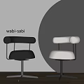 Wabi Sabi Style Black And White Leather Dining Chairs With Rounded Backrest And Metal Legs