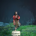 Game Character In Red Outfit Stands On Stone Pedestal With Green Grass Rocks Cave Background