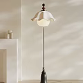Stylish Floor Lamp With White Ruffled Shade And Side Decorative Elements