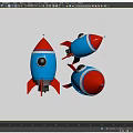 Three Colorful Cartoon Style Rocket Toys With Blue Red And White Stripes