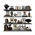 Decorative Ornaments Collection On Multi Tiered Shelf With Seashells Starfish Picture Frames And Books
