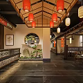 Traditional Chinese Restaurant With Red Lanterns Wooden Ceiling Round Window Stone Floor And Green Plants