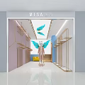 Modern Clothing Store Interior With Mannequin Butterfly Decorations And Clothing Racks