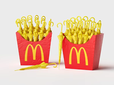 McDonald's Red Cartons Filled With Yellow Small Umbrellas One On Ground 3d model