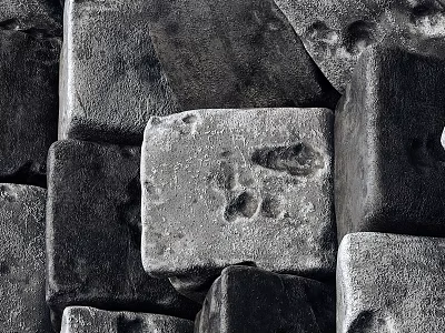 Stacked Gray Stones With Textured Surfaces And A Marked Stone In Center 3d model
