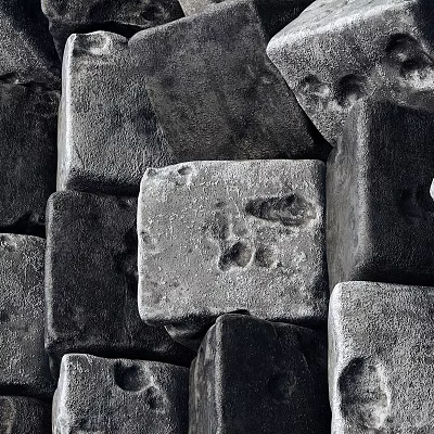 Stacked Gray Stones With Textured Surfaces And A Marked Stone In Center 3d model