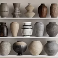 Diverse Ceramic Vessels With Various Shapes Colors And Textures Displayed On White Shelves