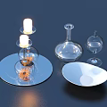Decorative Household Items Including Candle Holder With Candle Glass Vase Wine Glass And White Plate