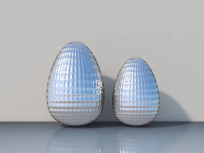 Two Egg Shaped Silver Metallic Decorative Ornament Set With Grid Pattern Shiny Reflective Surface 3d model