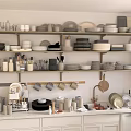 Organized Kitchenware Display On Shelves With White Cabinets And Ceramic Dishes
