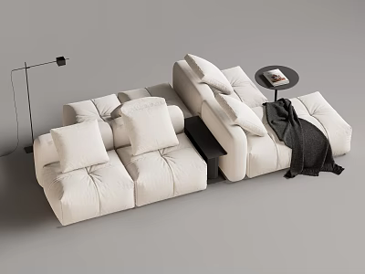 White Sectional Sofa with Plush Pillows Side Table Book and Cozy Black Blanket 3d model