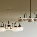 Ceiling Mounted Modern Chandeliers Featuring Multiple Glass Shades And Metal Frame