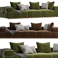 Modern Three Seater Sofa With Beige Gray Green Upholstery Pillows And Throw Blanket