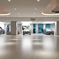 Cadillac Showroom Interior With Displayed Cars And Modern Design Elements