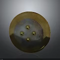 Ancient Golden Circular Shield With Four Decorative Dots And Historical Weapon Design