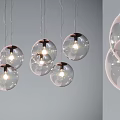 Multiple Modern Transparent Glass Ball Pendant Lights Hanging With Illuminated Bulbs