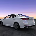 White Modern Sedan With Sleek Exterior Design Against Sunset Sky On Gray Pavement