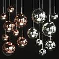 Stylish Modern Spherical Chandeliers With Reflective Metallic Surfaces For Interior Decoration
