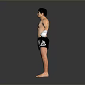 Shirtless Man With Chest Tattoo Wearing White Boxing Gloves And Everlast Shorts In Standing Pose