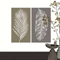 Decorative Wall Art With Palm Leaf And Feather Prints On Light Colored Wall 3d model