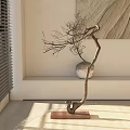 Bonsai Plant With Curved Branches In Ceramic Pot On White Shelf