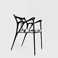 Modern Black Single Chair With Curved Arms And Hollow Seat Design