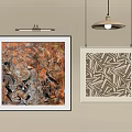Abstract And Geometric Artwork Hanging On Beige Wall With Pendant Lamp